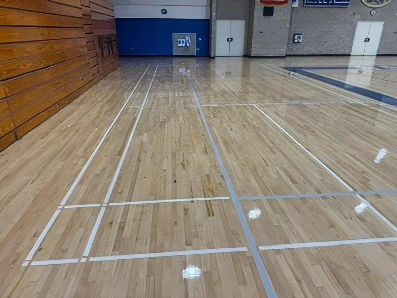 Refinished multipurpose gymnasium court with new lines