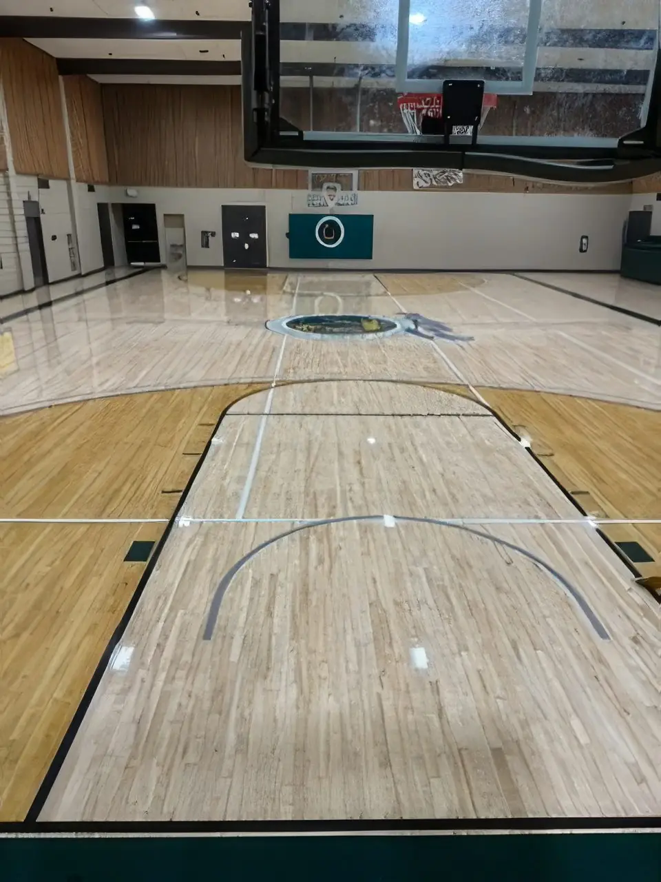 Gymnasium court during board repair and refinish